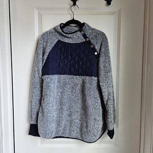 No brand name sweater!